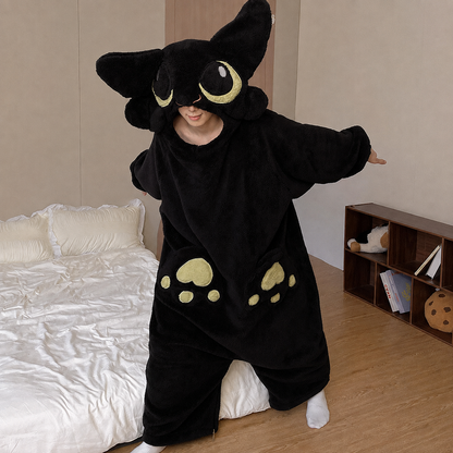 Black plush dragon onesie, worn